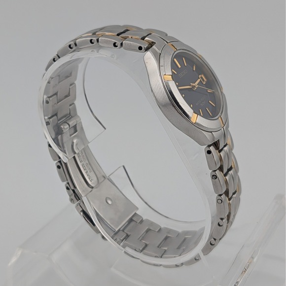 Seiko 7N82-0AG0 Blue Sunburst Two Tone Date Quartz Watch 50M main image 6